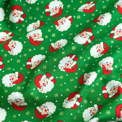 Vải giáng sinh ông già noel nền xanh lá Winking Santas CM9639-GREEN-D - Hình ảnh 2